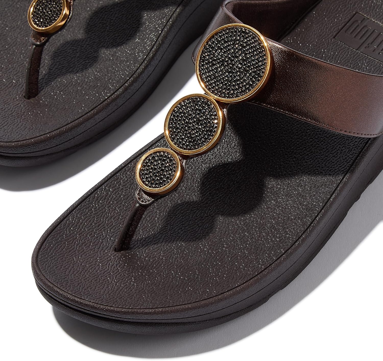 image:imageFitFlop Womens Halo BeadCircle Metallic Hbar Slides Wedge Sandal Leather SlipOn with Microwobbleboard Technology amp Slip Resistant Rubber Outsole Comfortable Footwear Synthetic Rhinestones Ornamented SlipOnMetallic Chocolate Brown