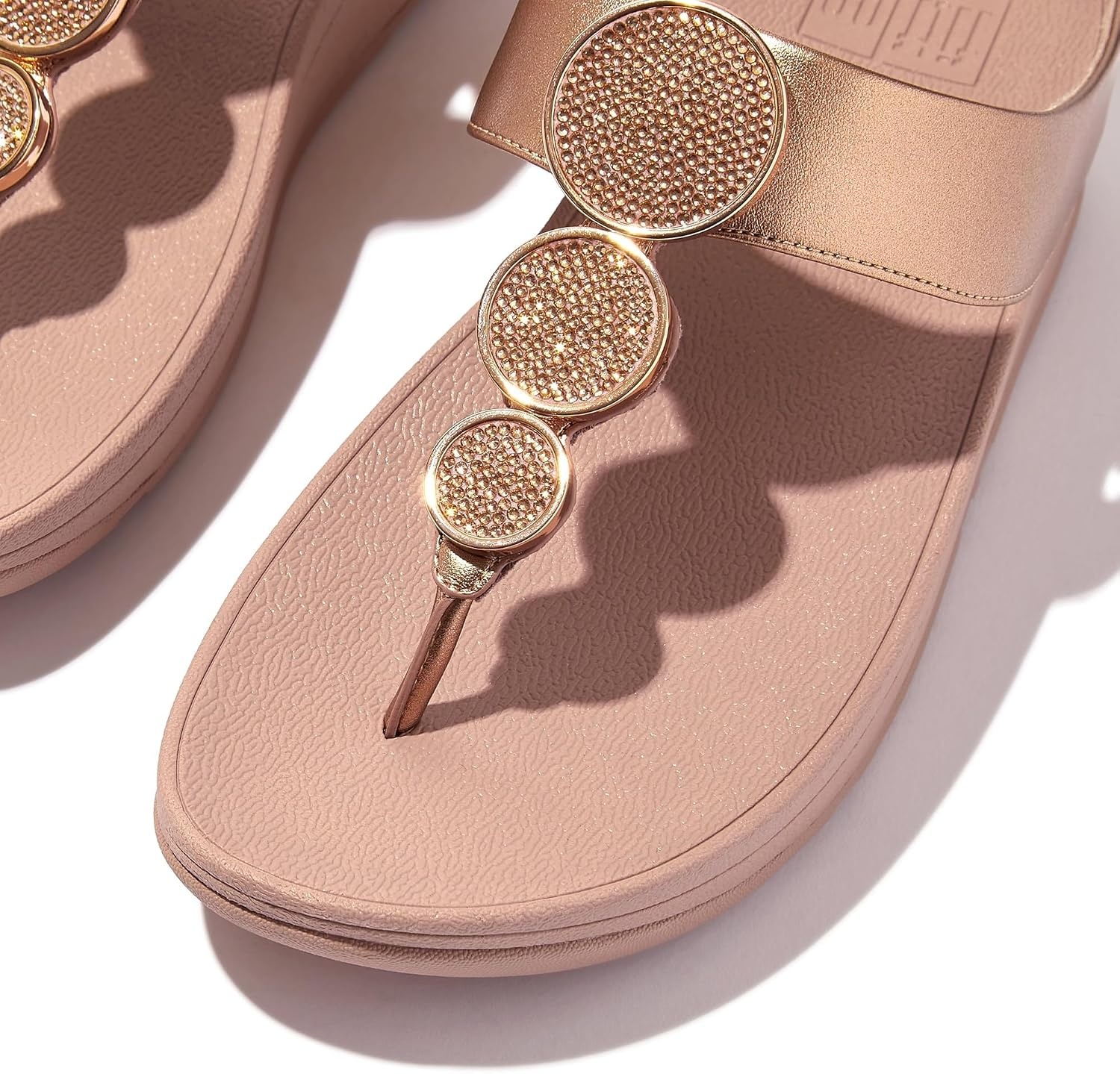 image:imageFitFlop Womens Halo BeadCircle Metallic Hbar Slides Wedge Sandal Leather SlipOn with Microwobbleboard Technology amp Slip Resistant Rubber Outsole Comfortable Footwear Synthetic Rhinestones Ornamented SlipOnRose Gold