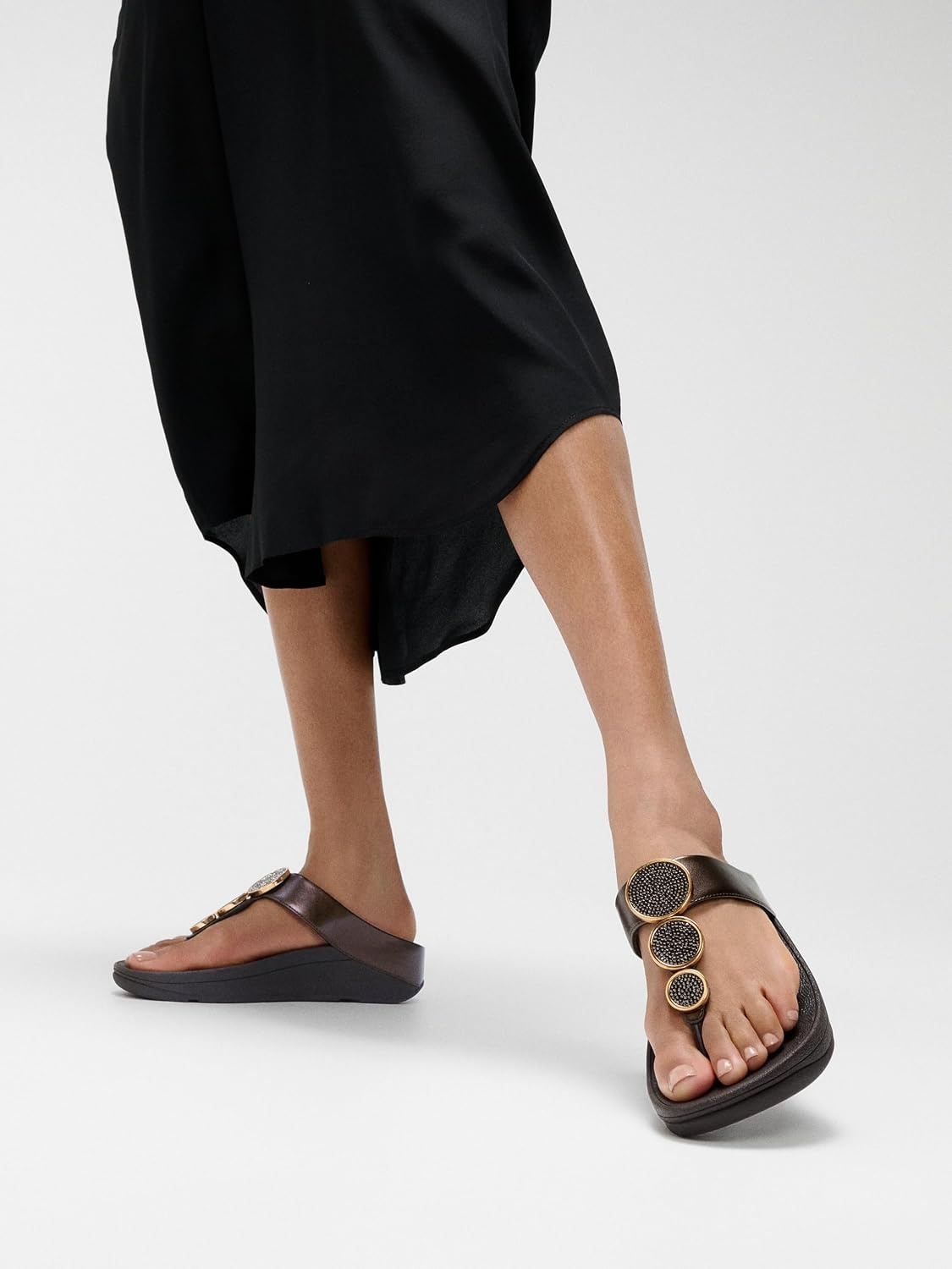 image:imageFitFlop Womens Halo BeadCircle Metallic Hbar Slides Wedge Sandal Leather SlipOn with Microwobbleboard Technology amp Slip Resistant Rubber Outsole Comfortable Footwear Synthetic Rhinestones Ornamented SlipOnMetallic Chocolate Brown