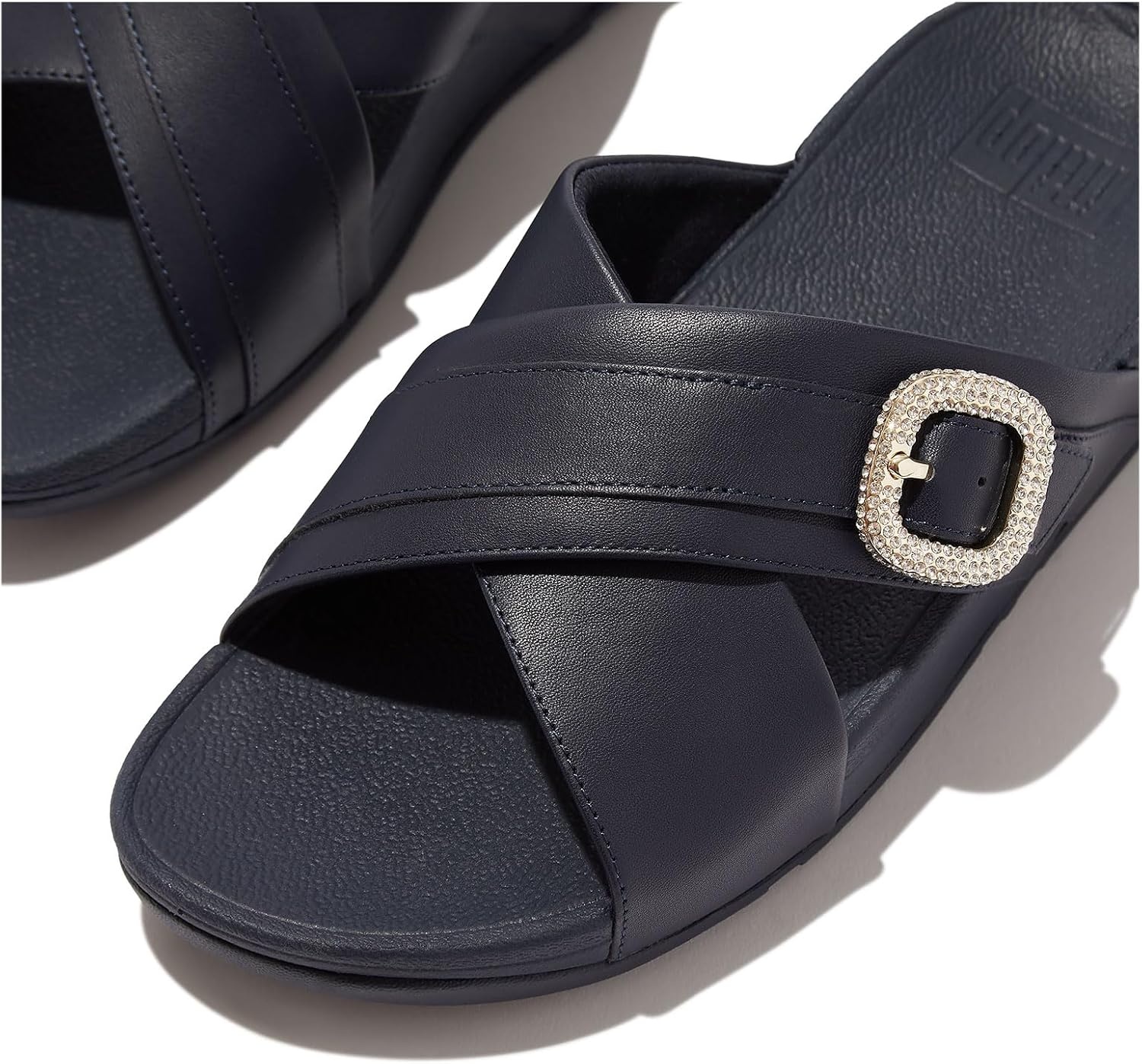 image:imageFitFlop Womens Lulu CrystalBuckle Leather Cross SlidesMidnight Navy