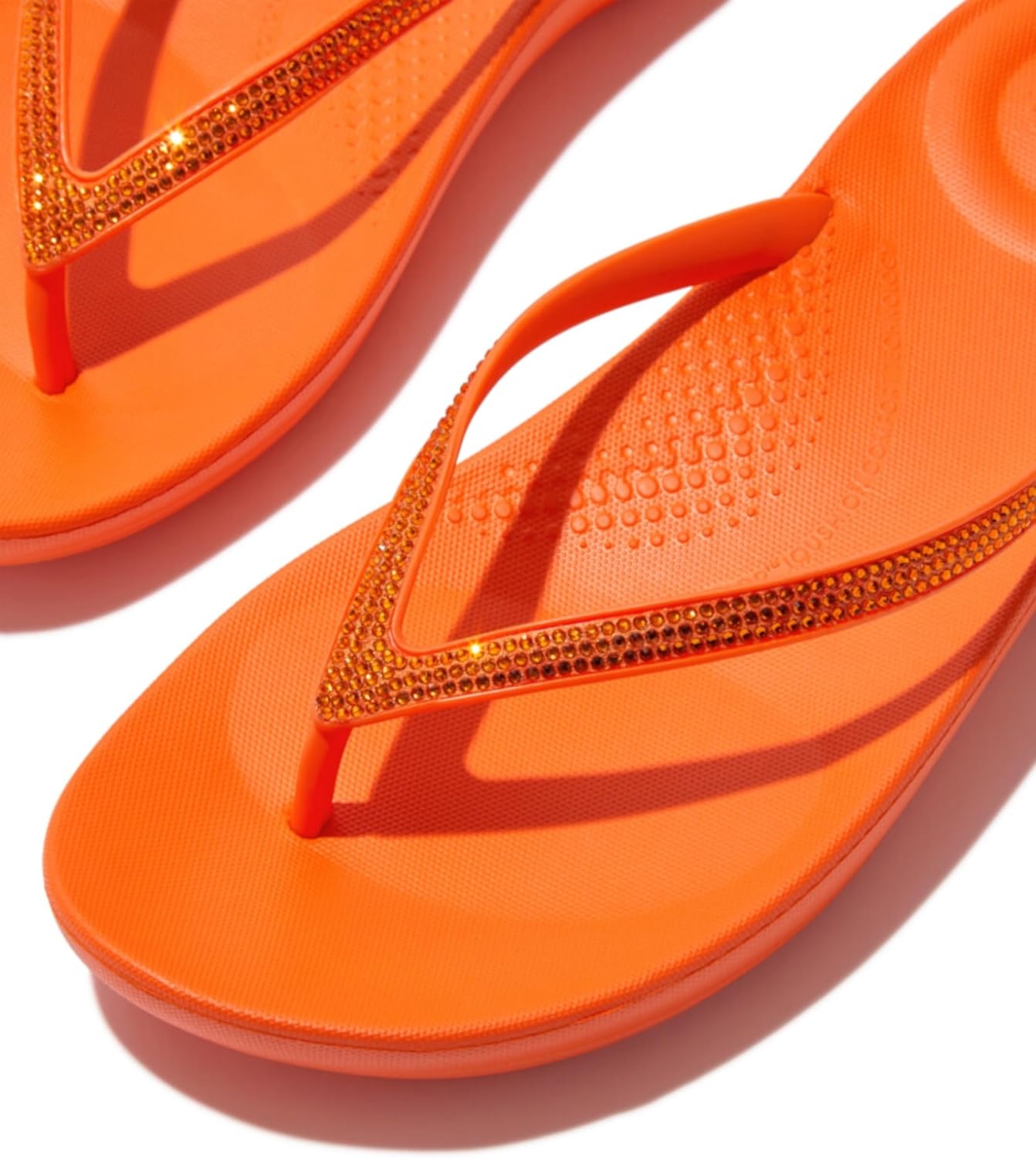image:imageFitFlop Womens iQushion Sparkle Ergonomic Flip Flops for Walking Lightweight Waterproof Cushioned Thong Sandals for Women with Non Slip Bottom and Arch Support Lightweight Waterproof Walking Sandals wCushioned Comfort amp Arch SupportPop Orange