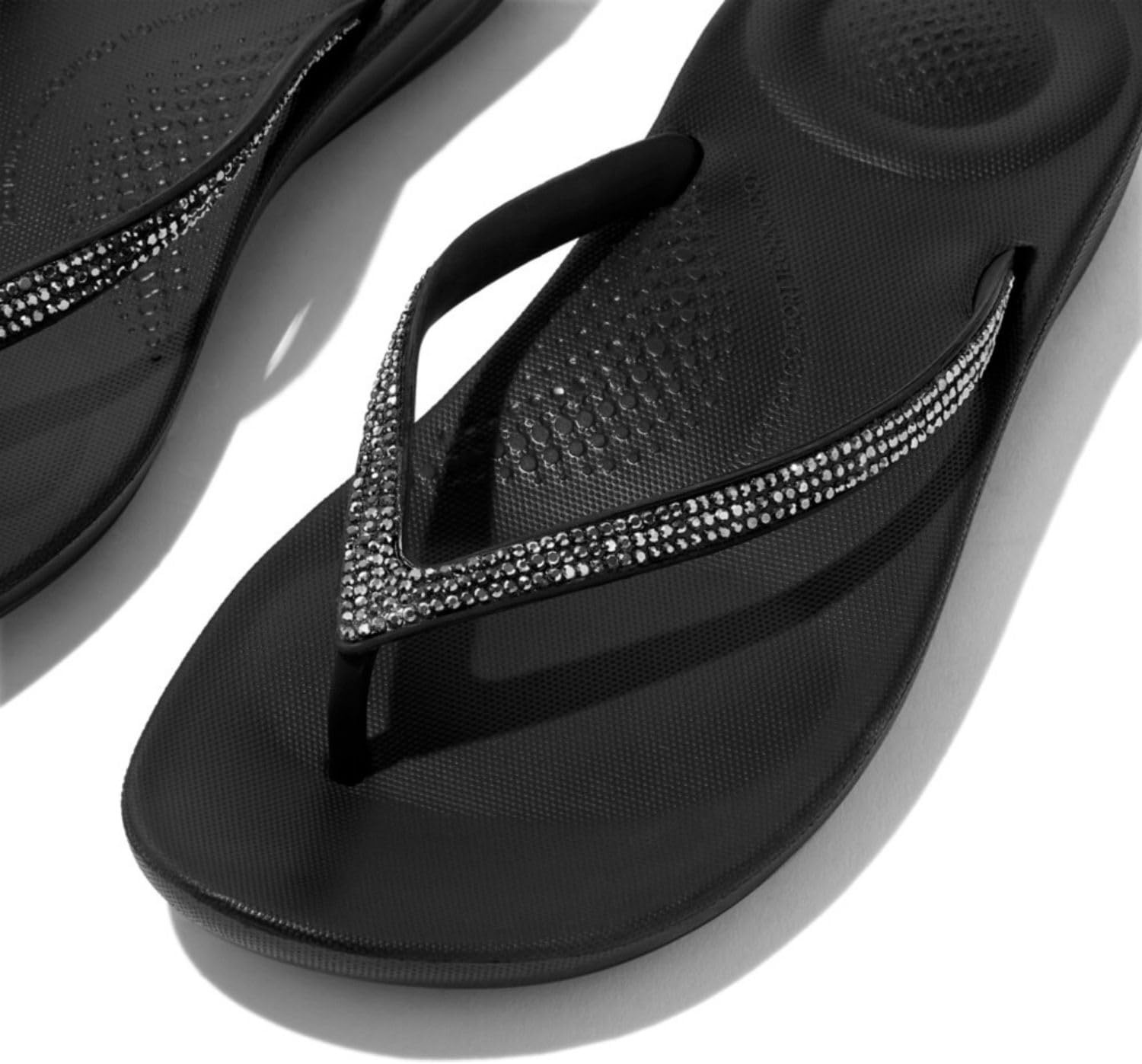 image:imageFitFlop Womens iQushion Sparkle Ergonomic Flip Flops for Walking Lightweight Waterproof Cushioned Thong Sandals for Women with Non Slip Bottom and Arch Support Lightweight Waterproof Walking Sandals wCushioned Comfort amp Arch SupportBlack