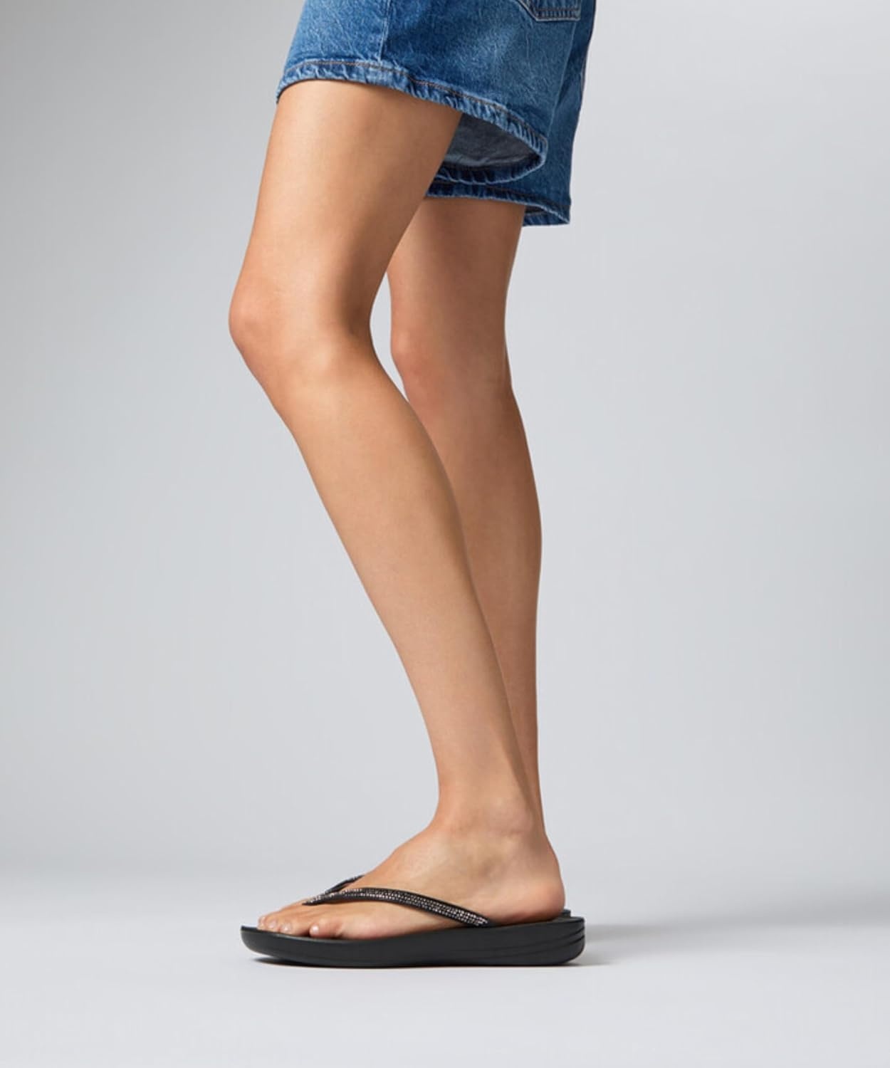 image:imageFitFlop Womens iQushion Sparkle Ergonomic Flip Flops for Walking Lightweight Waterproof Cushioned Thong Sandals for Women with Non Slip Bottom and Arch Support Lightweight Waterproof Walking Sandals wCushioned Comfort amp Arch SupportBlack