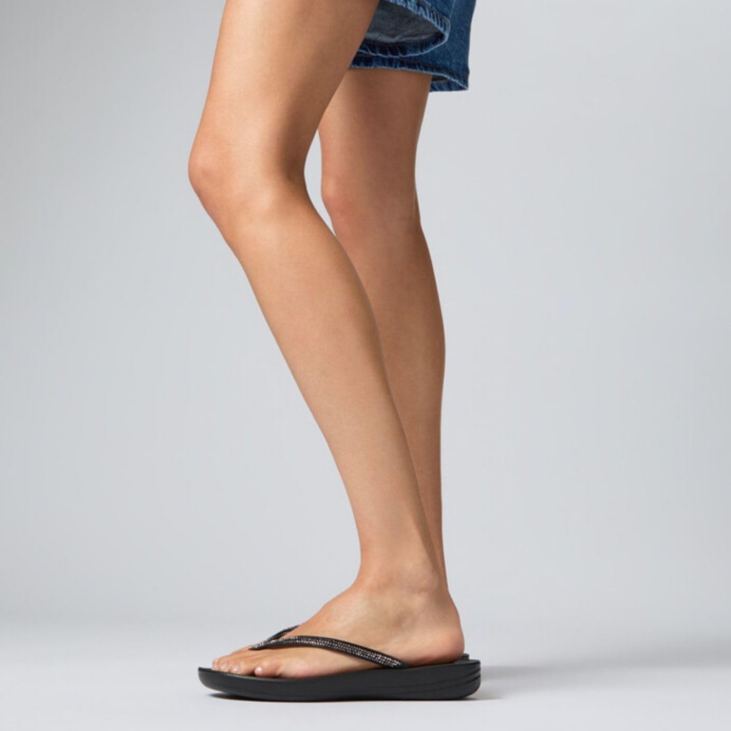 image:imageFitFlop Womens iQushion Sparkle Ergonomic Flip Flops for Walking Lightweight Waterproof Cushioned Thong Sandals for Women with Non Slip Bottom and Arch Support Lightweight Waterproof Walking Sandals wCushioned Comfort amp Arch SupportBlack