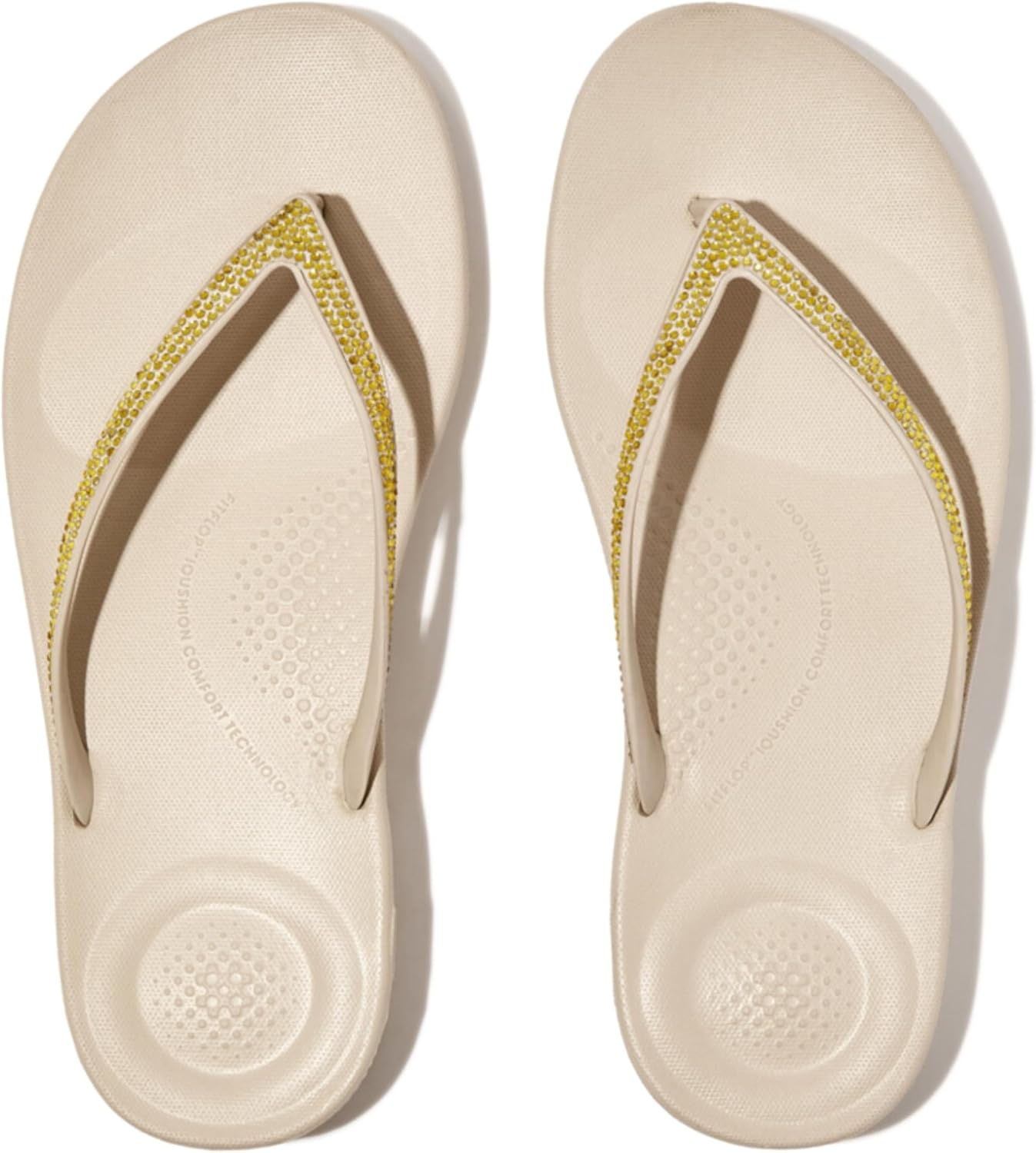 image:imageFitFlop Womens iQushion Sparkle Ergonomic Flip Flops for Walking Lightweight Waterproof Cushioned Thong Sandals for Women with Non Slip Bottom and Arch Support Lightweight Waterproof Walking Sandals wCushioned Comfort amp Arch SupportStone Beige