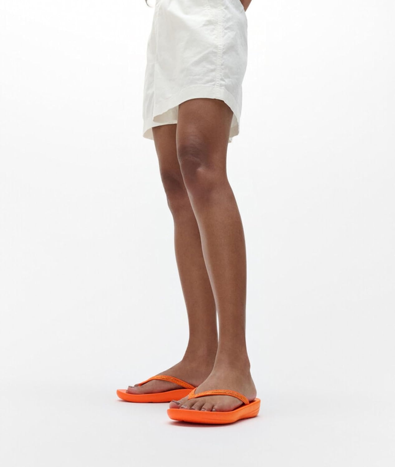 image:imageFitFlop Womens iQushion Sparkle Ergonomic Flip Flops for Walking Lightweight Waterproof Cushioned Thong Sandals for Women with Non Slip Bottom and Arch Support Lightweight Waterproof Walking Sandals wCushioned Comfort amp Arch SupportPop Orange